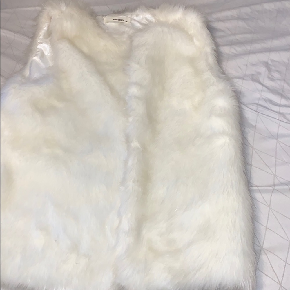 White fur vest